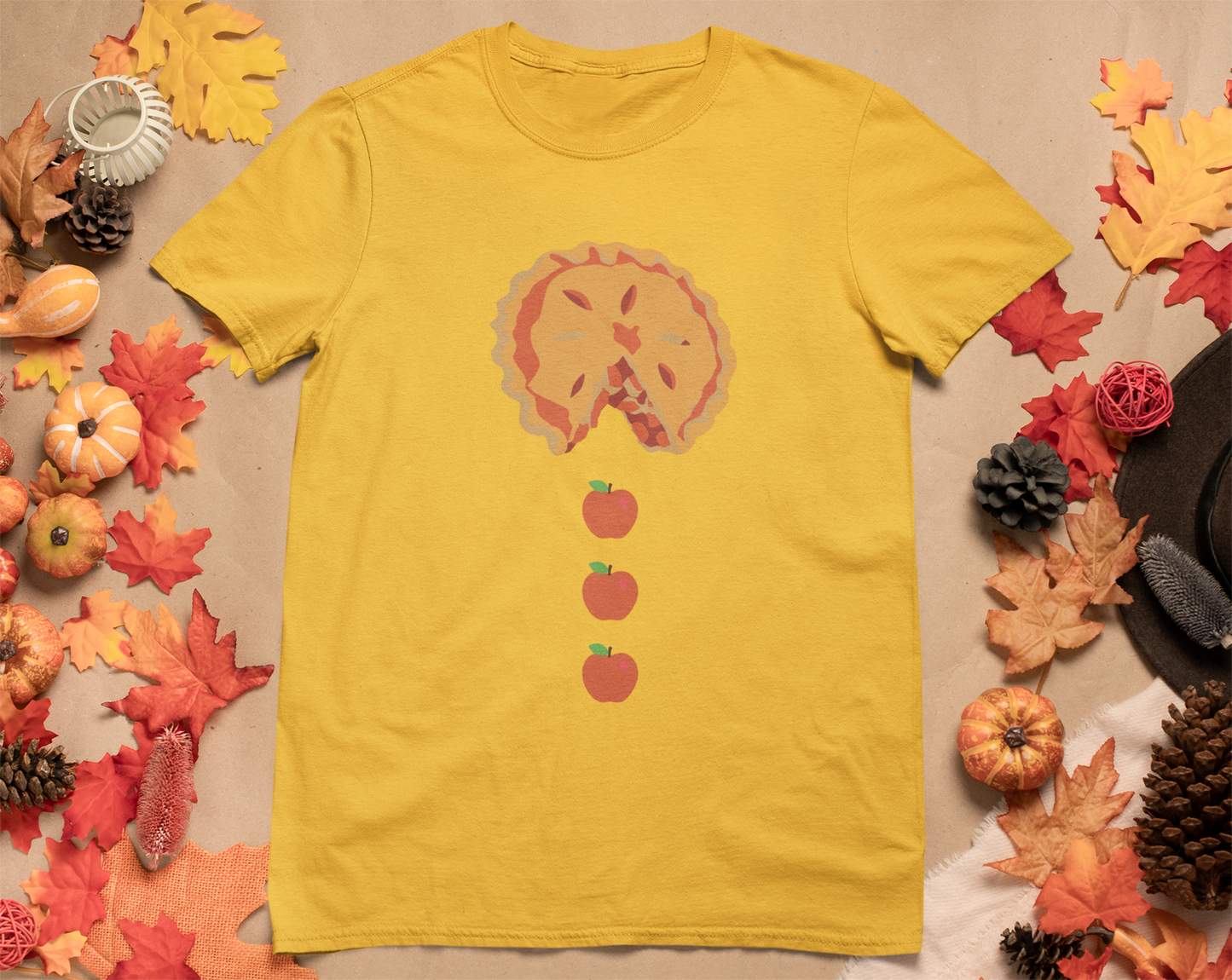 Pacman Apple Pie Tee for Thanksgiving, Thanksgiving apple pie apparel, fall pie lover graphic tee, retro arcade food art shirt, Pac-Man ghost pie chaser tee, whimsical floating apple design,